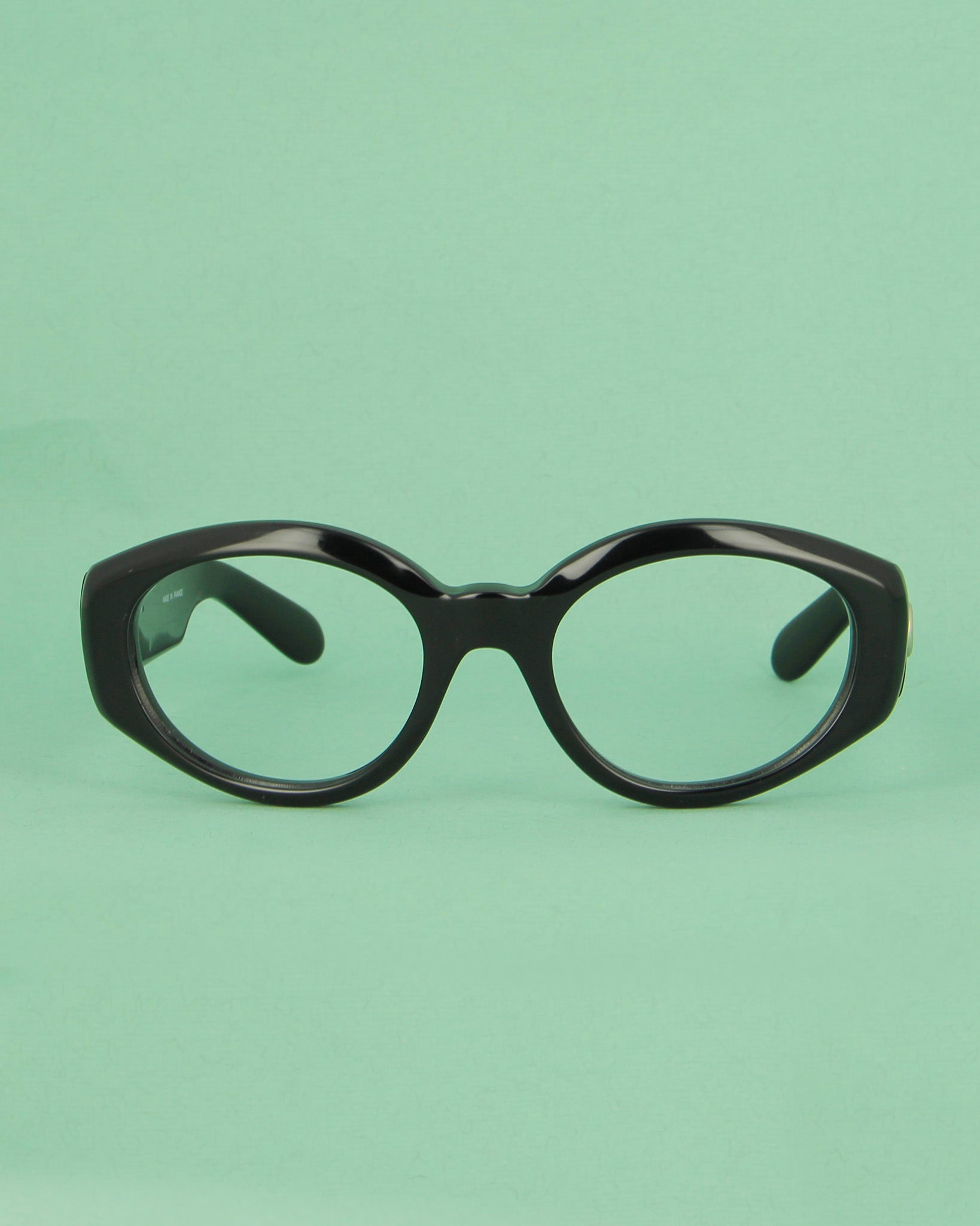 Patrick Kelly Papaye lunettes de soleil ovales noires