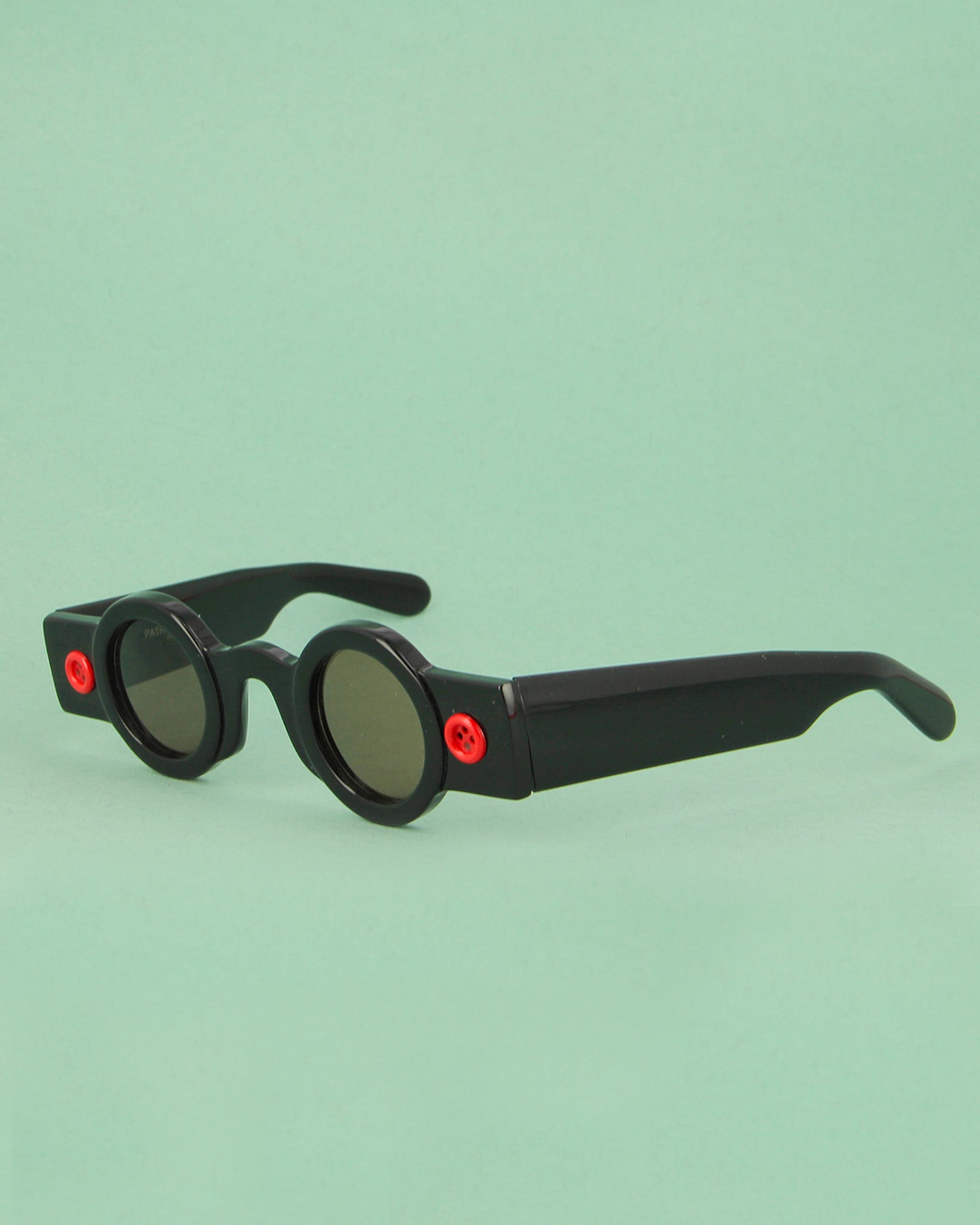 Patrick Kelly Peanut 22 lunettes de soleil rondes noires