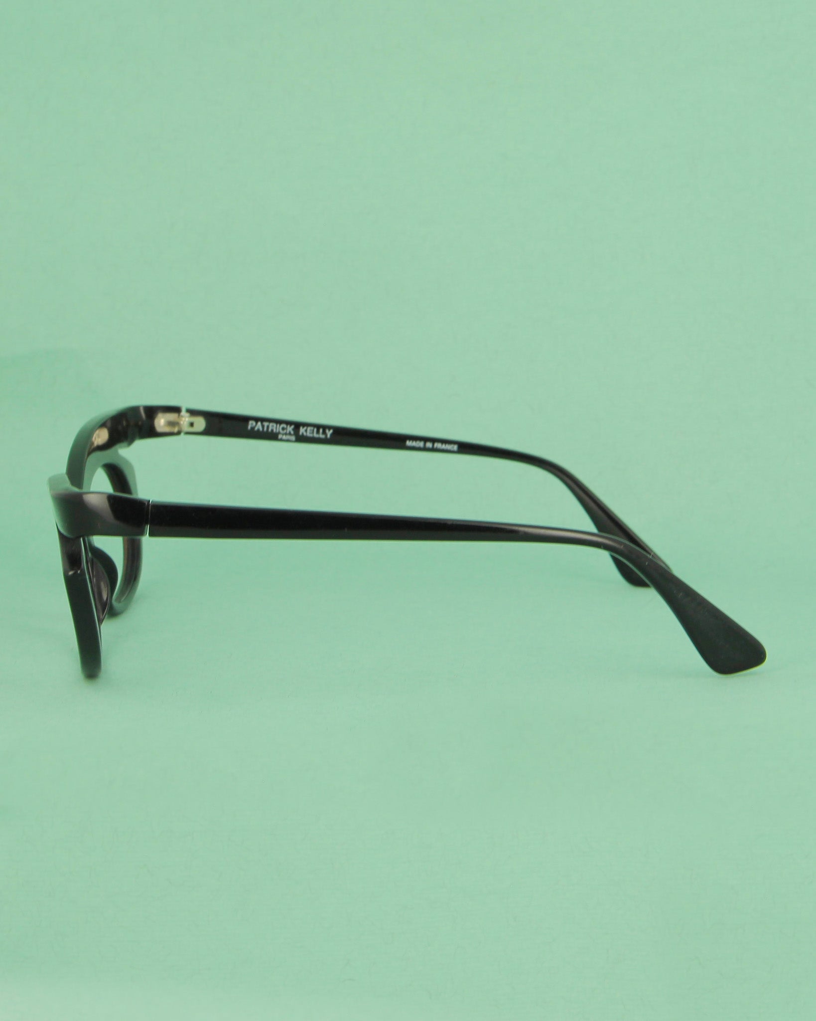 Patrick Kelly Python 22 lunettes de vue noires cat eye