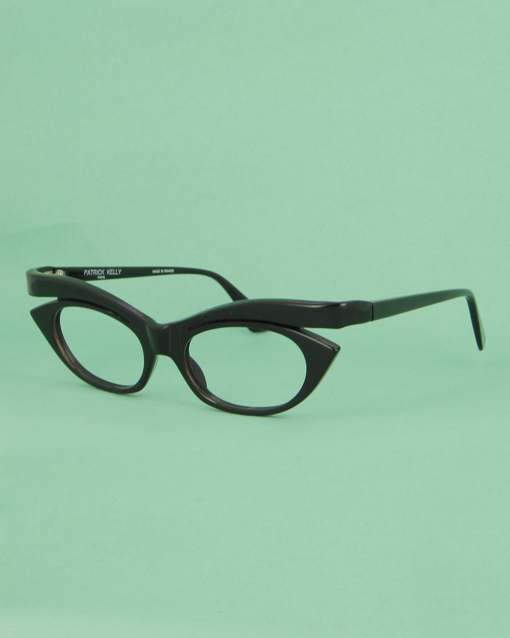 Patrick Kelly Python 22 lunettes de vue noires cat eye