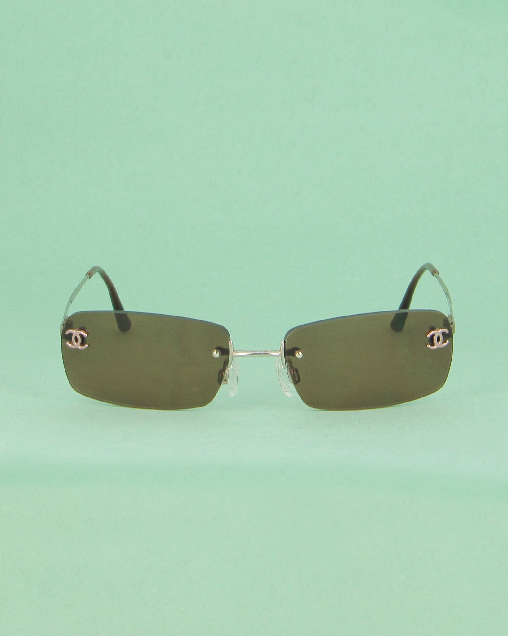 Chanel C.116 lunettes de soleil marron percées rectangle