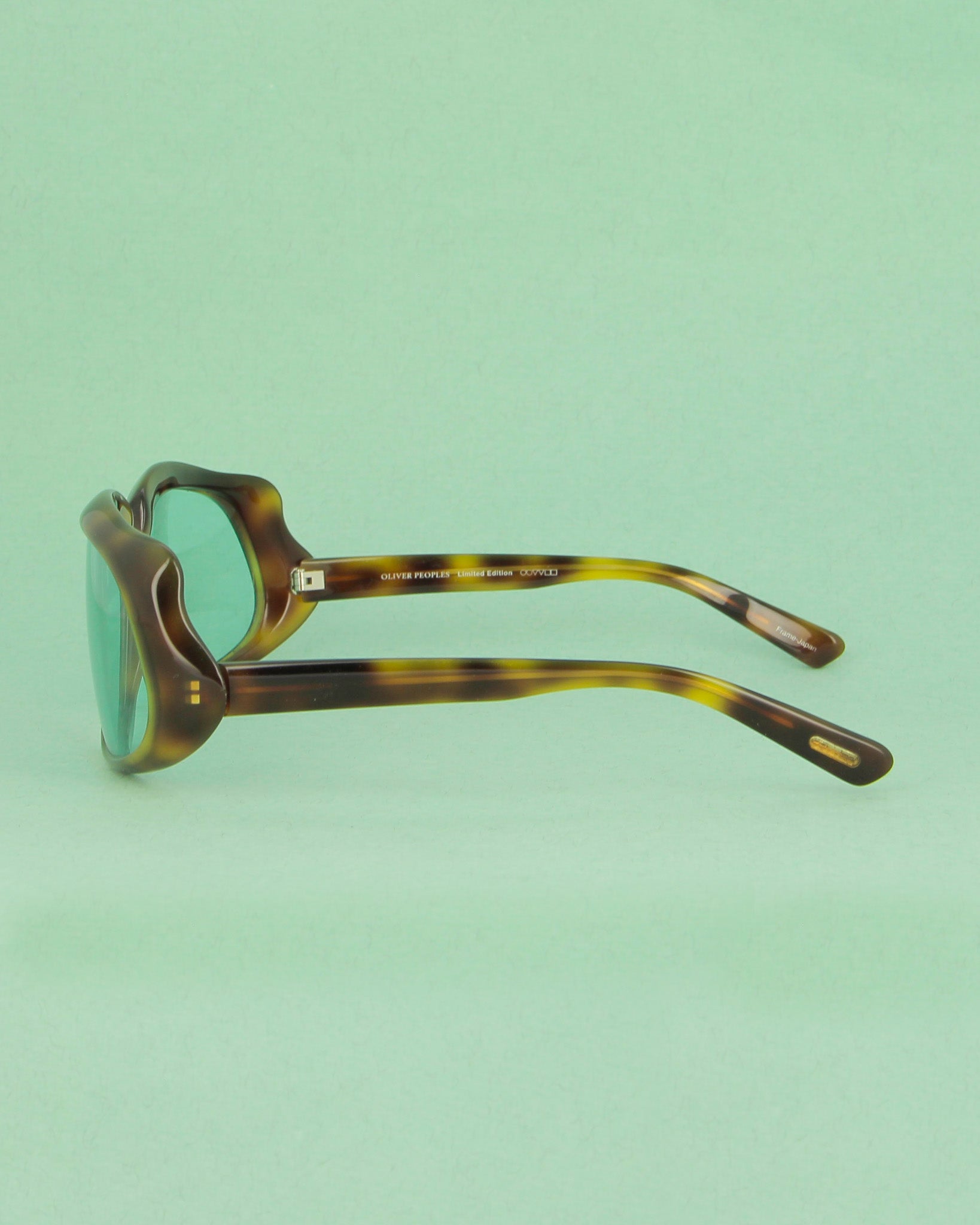 Oliver Peoples 6415 lunettes de soleil marron