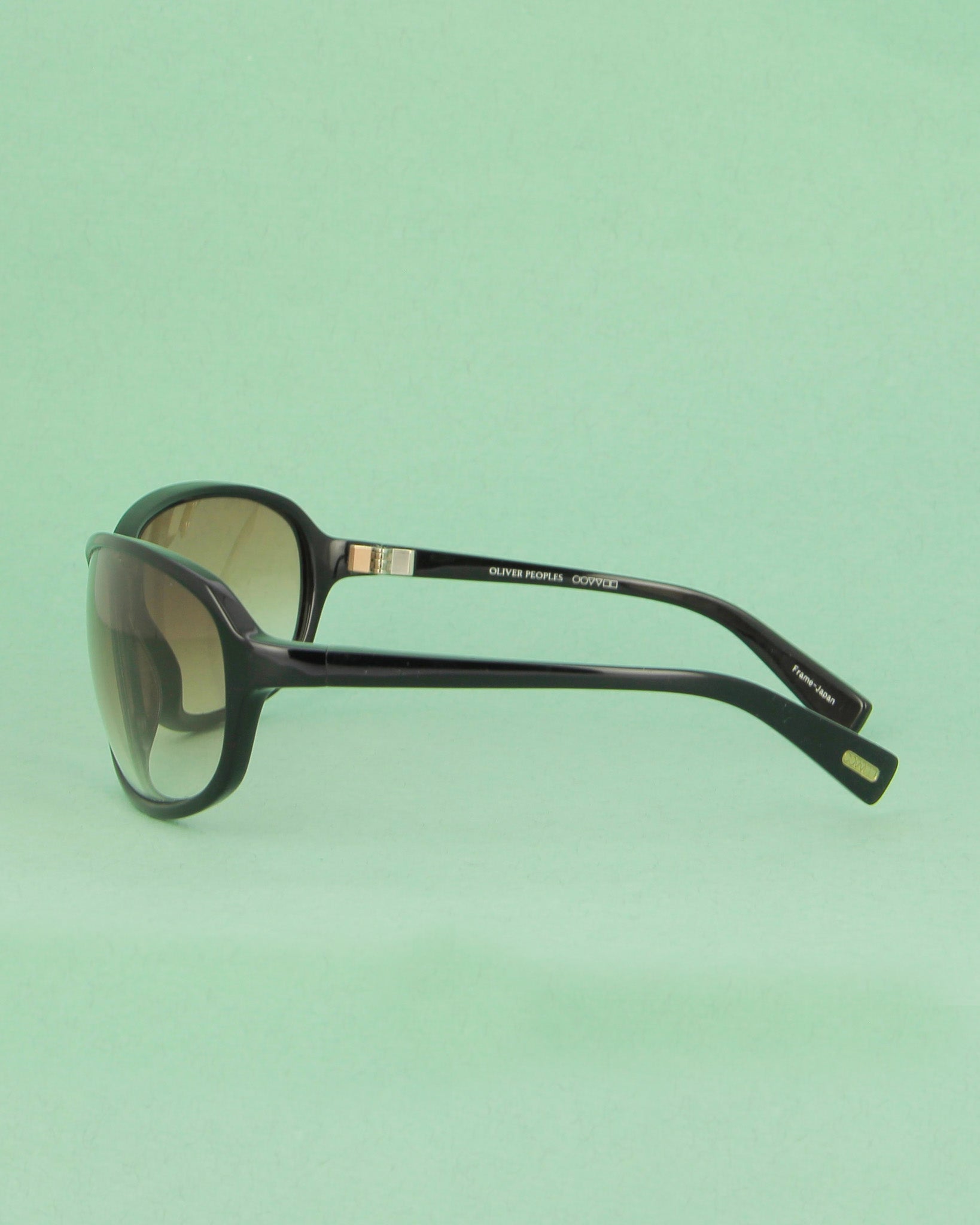 Oliver Peoples 6615 lunettes de soleil ovale noir