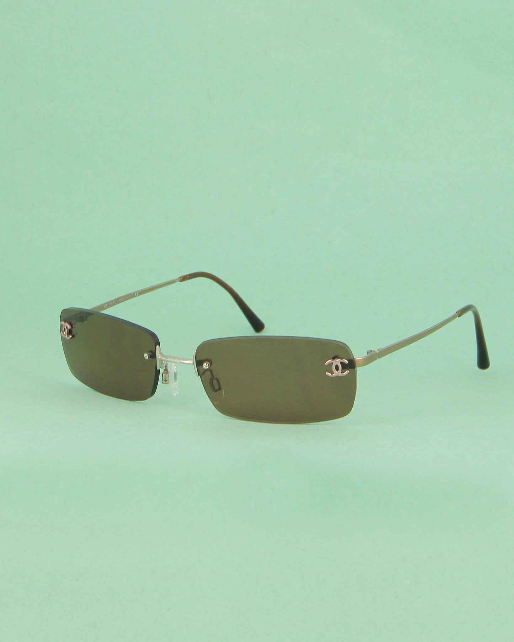 Chanel C.116 lunettes de soleil marron percées rectangle