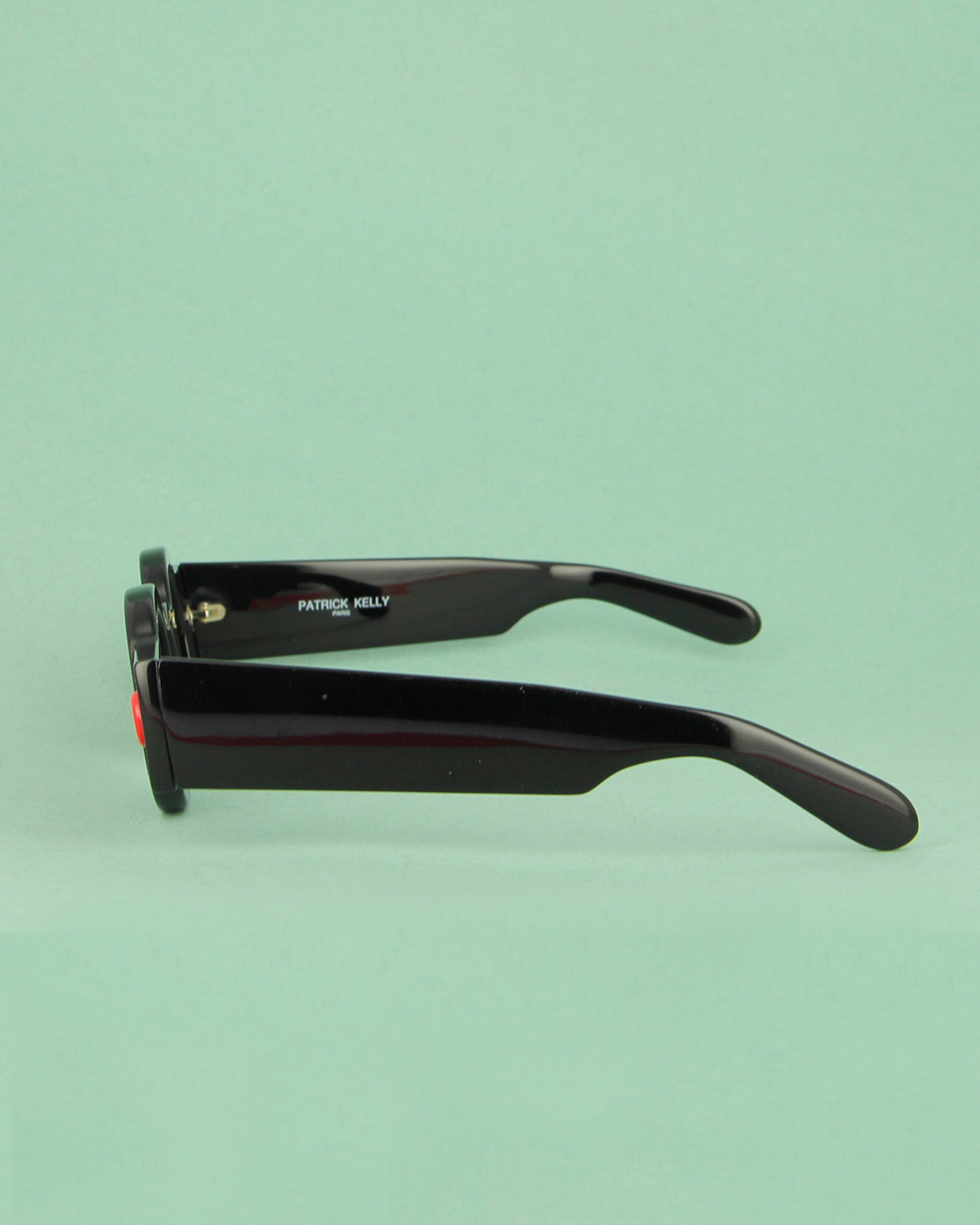 Patrick Kelly Peanut 22 lunettes de soleil rondes noires